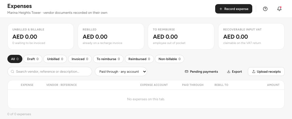 The Expenses list with its tabs, the Upload receipts button and the Record expense button